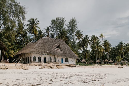 hut being supported by ropes
